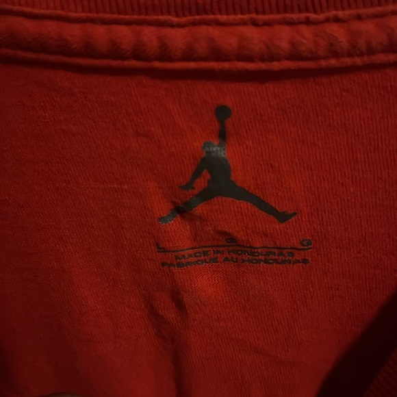 Red shirt with blue jump man letters - Picture 3 of 4